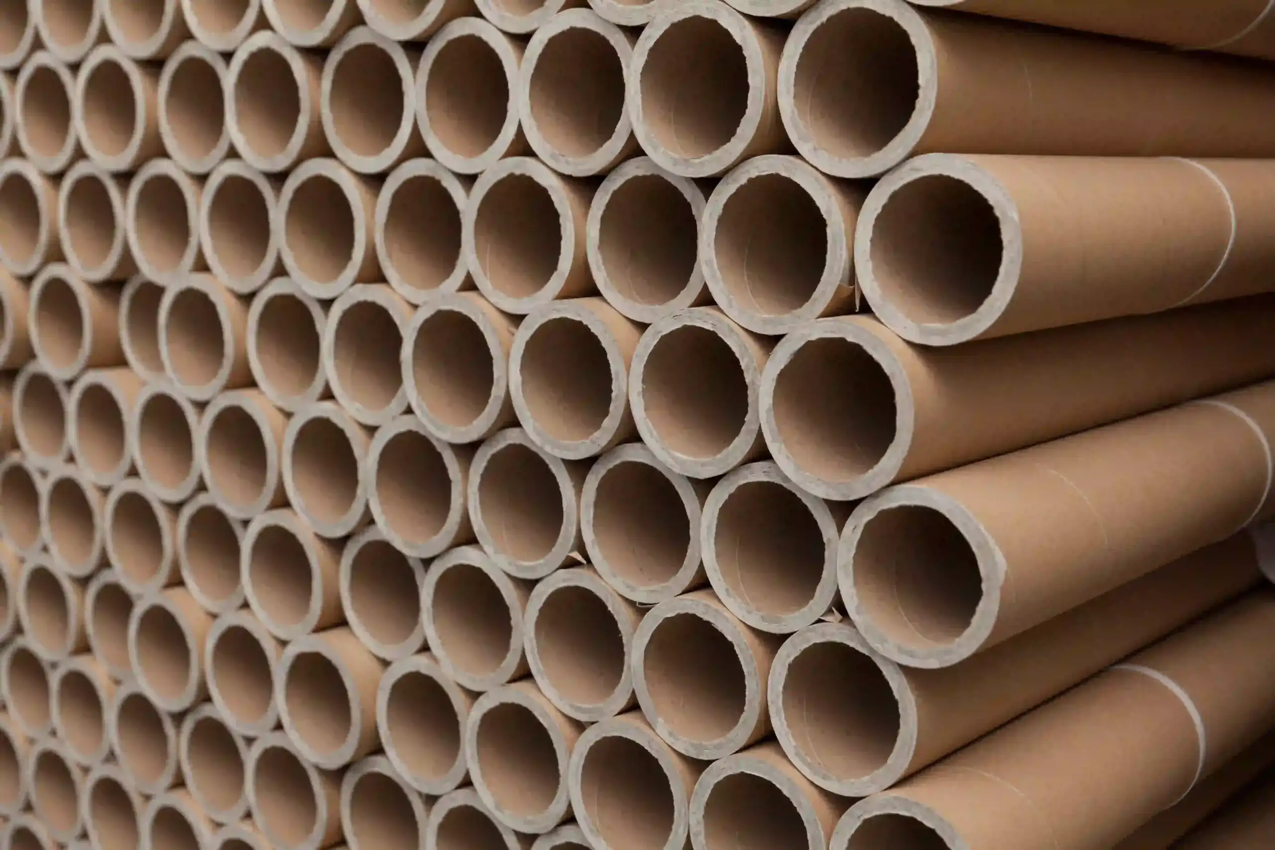 industrial tubes brown stacked tubes